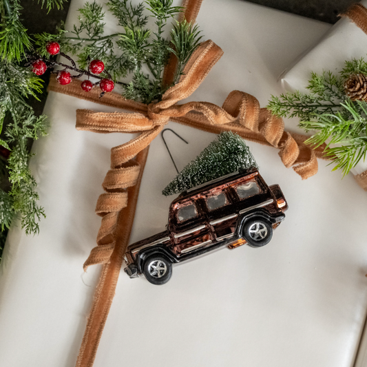 Brown SUV with Tree Ornament